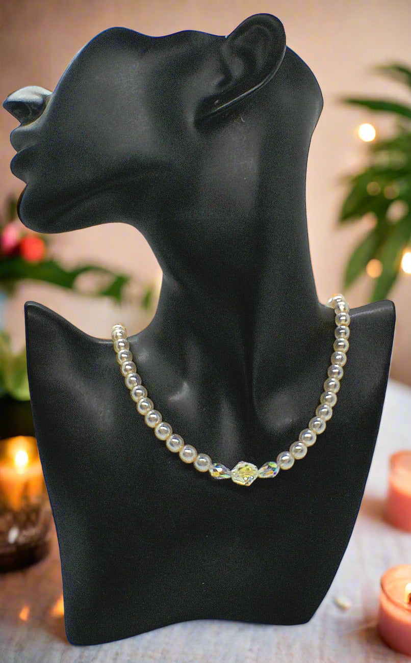 https://www.artistryjewelry.net/products/precious-light-peach-silver-crystal-and-pearl-beaded-necklace-handcrafted-by-artistry-jewelry
