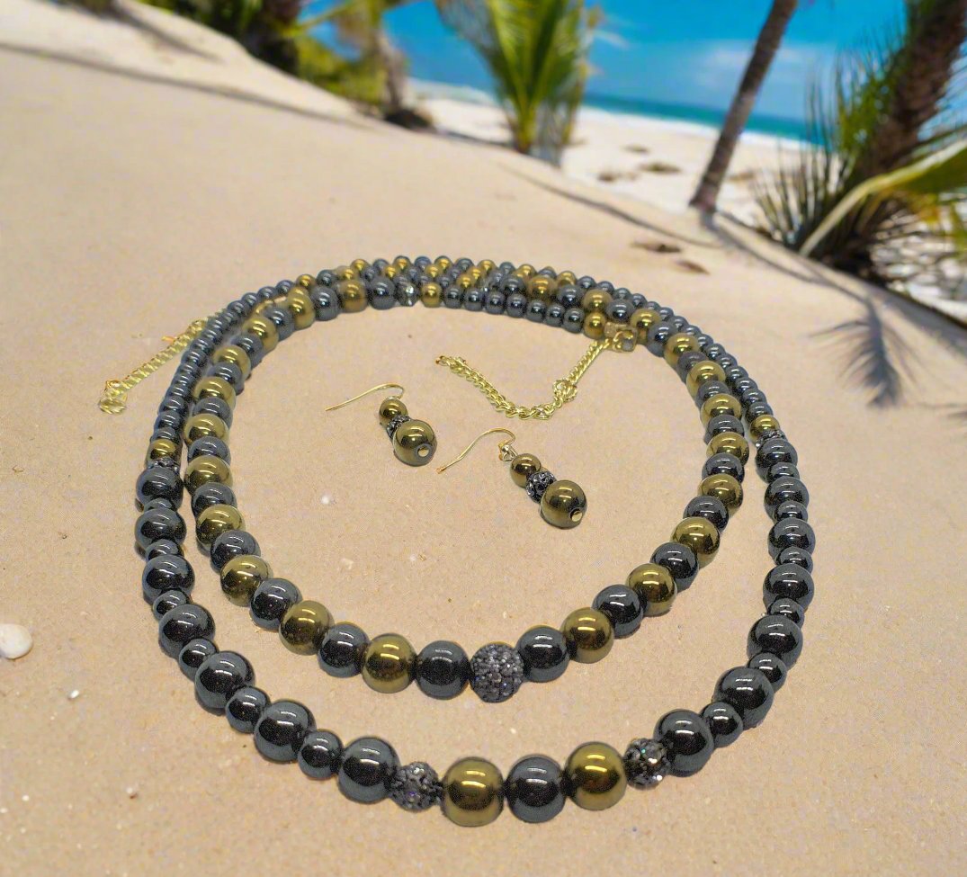 Go To: https://www.artistryjewelry.net/products/gorgeous-gold-black-hematite-two-strand-beaded-necklace-set-handcrafted-by-artistry-jewelry