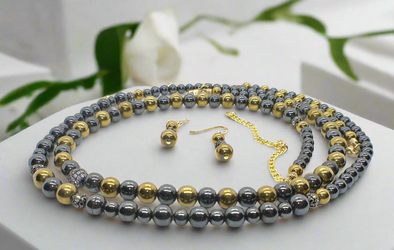 Go To: https://www.artistryjewelry.net/products/gorgeous-gold-black-hematite-two-strand-beaded-necklace-set-handcrafted-by-artistry-jewelry