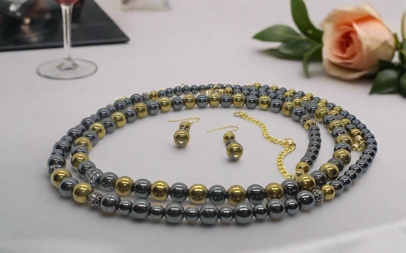 Go To: https://www.artistryjewelry.net/products/gorgeous-gold-black-hematite-two-strand-beaded-necklace-set-handcrafted-by-artistry-jewelry