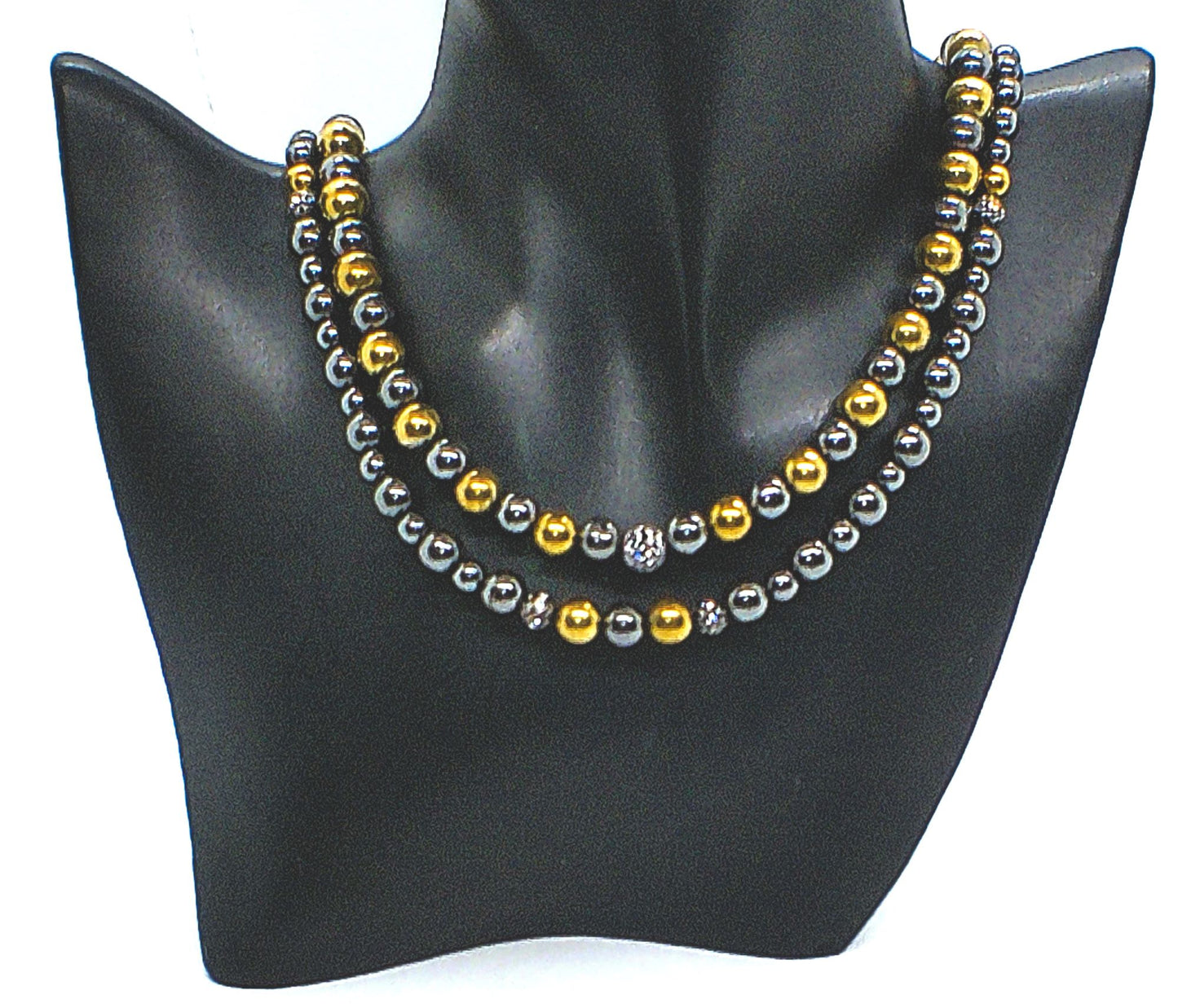 Go To: https://www.artistryjewelry.net/products/gorgeous-gold-black-hematite-two-strand-beaded-necklace-set-handcrafted-by-artistry-jewelry