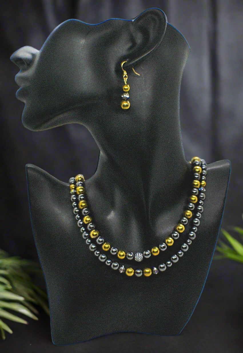 Go To: https://www.artistryjewelry.net/products/gorgeous-gold-black-hematite-two-strand-beaded-necklace-set-handcrafted-by-artistry-jewelry