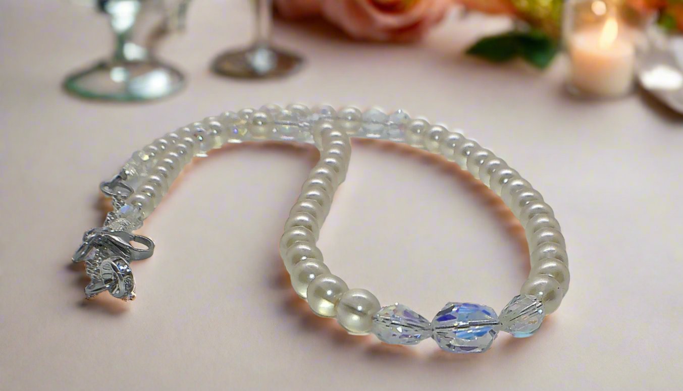 https://www.artistryjewelry.net/products/precious-light-peach-silver-crystal-and-pearl-beaded-necklace-handcrafted-by-artistry-jewelry