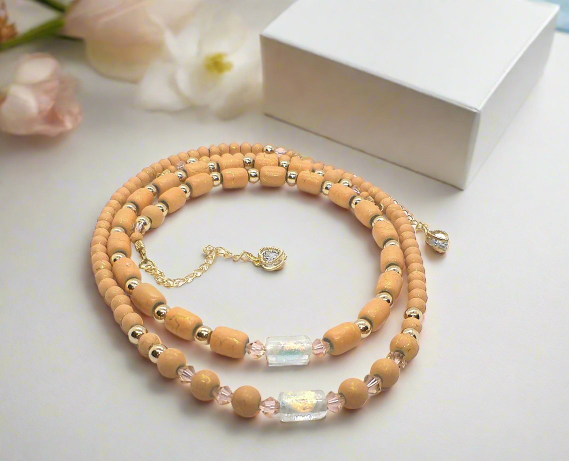 https://www.artistryjewelry.net/products/fabulous-peach-desert-sun-and-gold-hematite-one-of-a-kind-beaded-necklace-handcrafted-by-artistry-jewelry