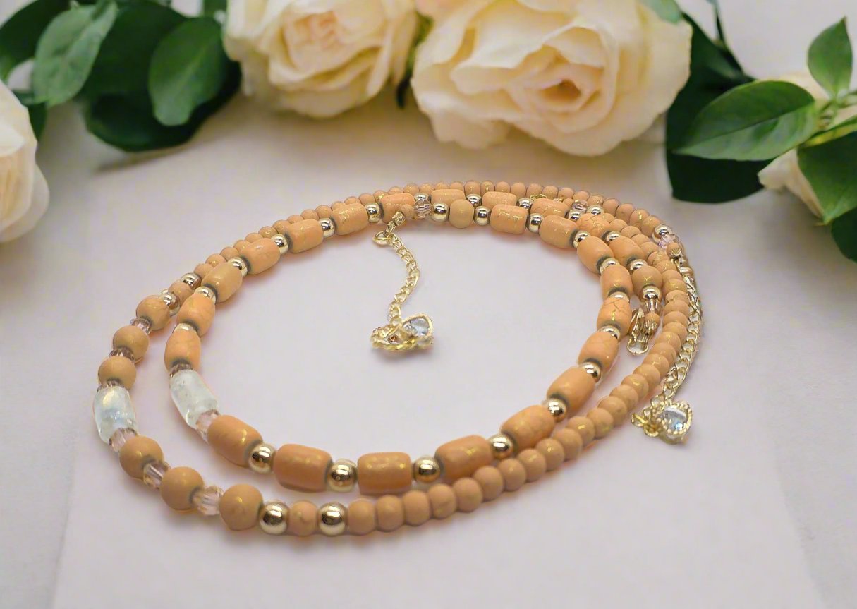 https://www.artistryjewelry.net/products/fabulous-peach-desert-sun-and-gold-hematite-one-of-a-kind-beaded-necklace-handcrafted-by-artistry-jewelry