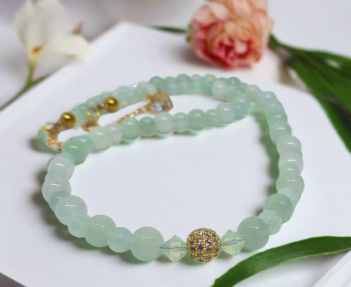 https://www.artistryjewelry.net/products/alluring-burness-jade-crystal-and-hematite-beaded-necklace-by-artistry-jewelry