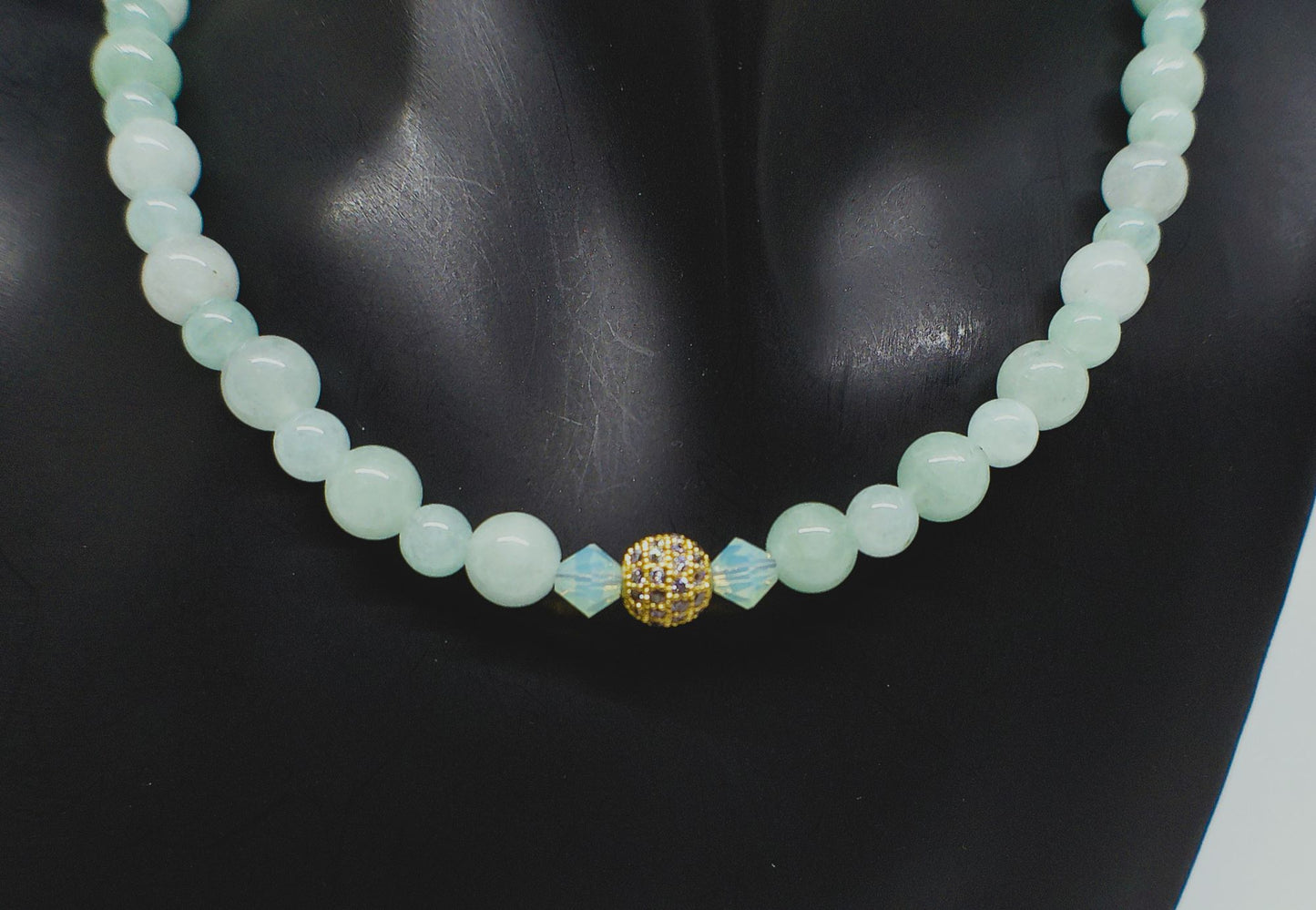 https://www.artistryjewelry.net/products/alluring-burness-jade-crystal-and-hematite-beaded-necklace-by-artistry-jewelry