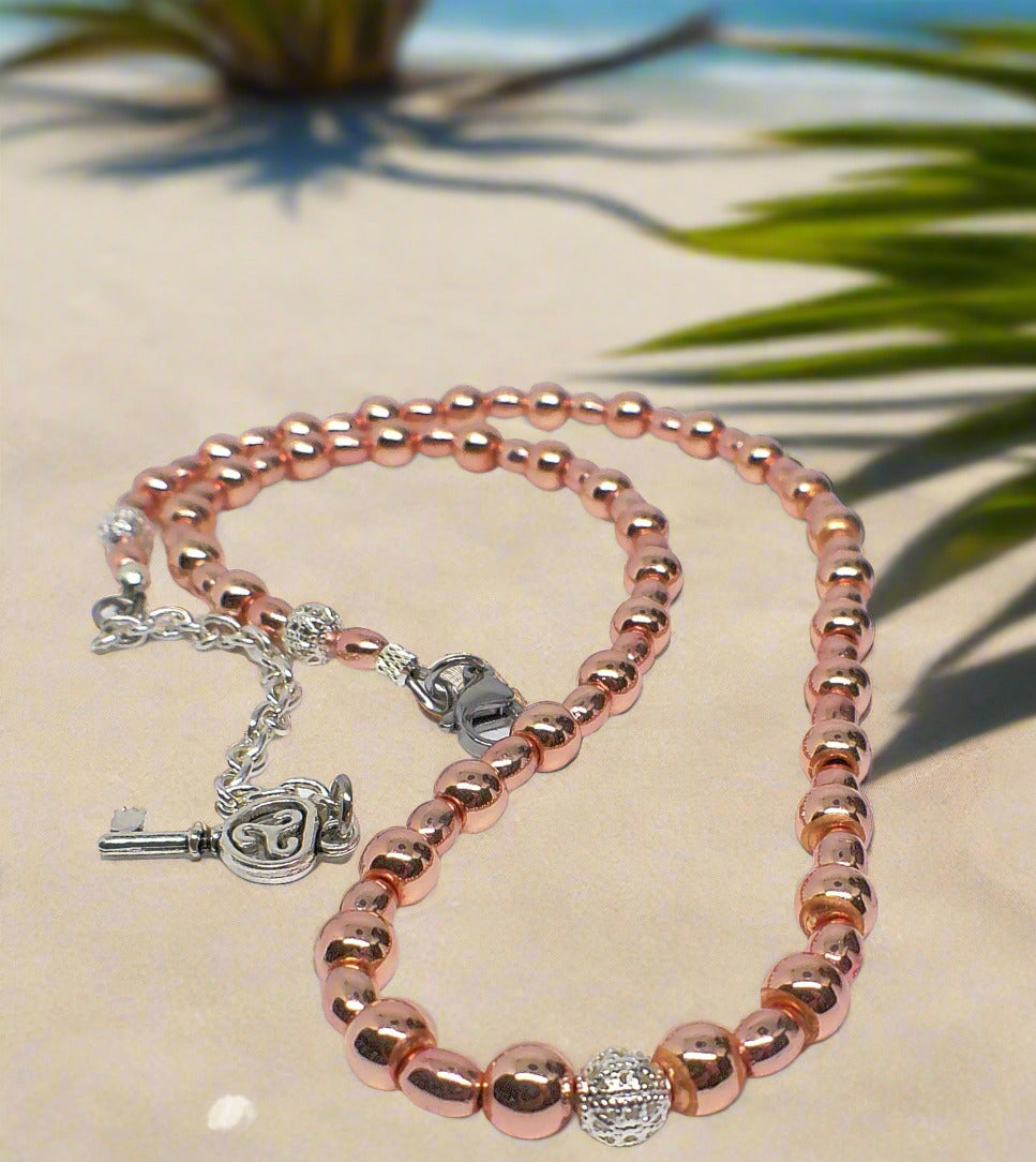 https://www.artistryjewelry.net/products/charming-rose-gold-hematite-beaded-necklace