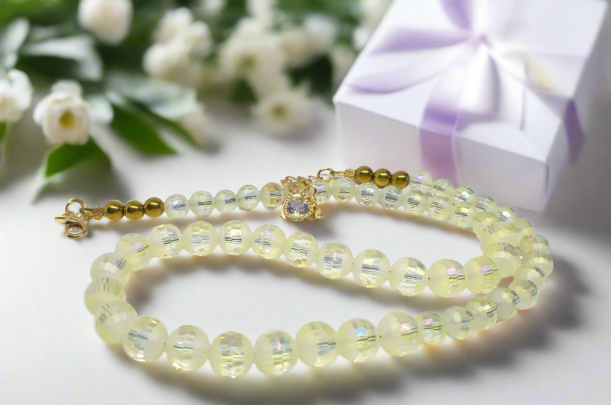 https://www.artistryjewelry.net/products/magnificent-celestial-opal-crystal-and-hematite-beaded-necklace