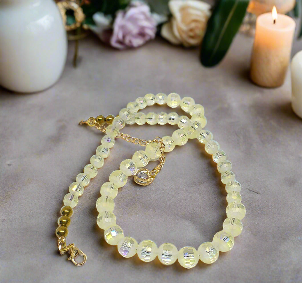 https://www.artistryjewelry.net/products/magnificent-celestial-opal-crystal-and-hematite-beaded-necklace