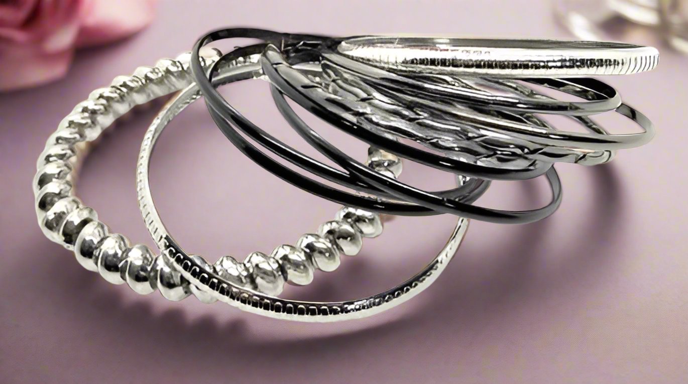 https://www.artistryjewelry.net/products/silver-and-black-bangle-bracelet