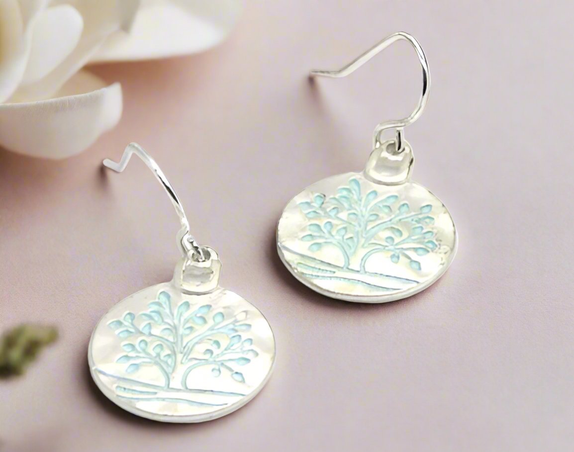 https://www.artistryjewelry.net/products/beautiful-silver-tree-of-life-earrings