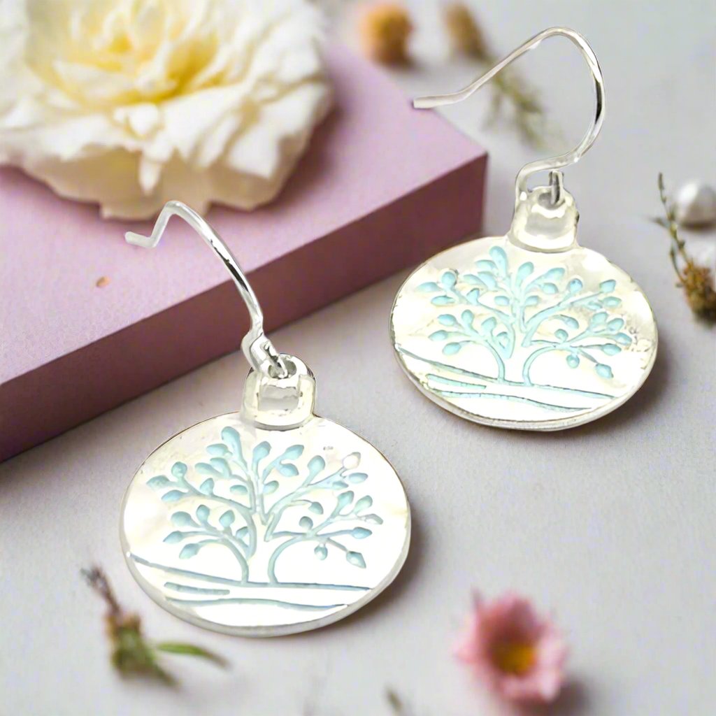 https://www.artistryjewelry.net/products/beautiful-silver-tree-of-life-earrings