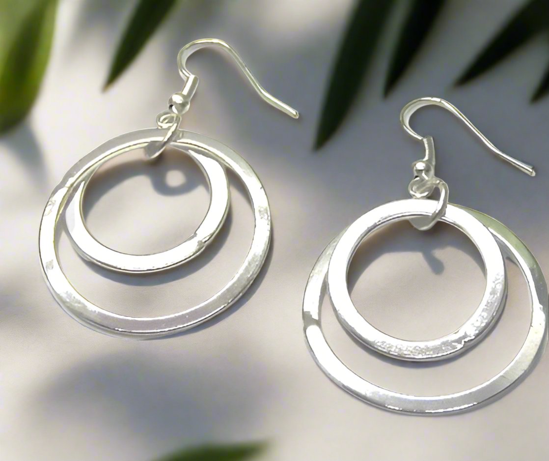 https://www.artistryjewelry.net/products/fantastic-silver-circle-earrings