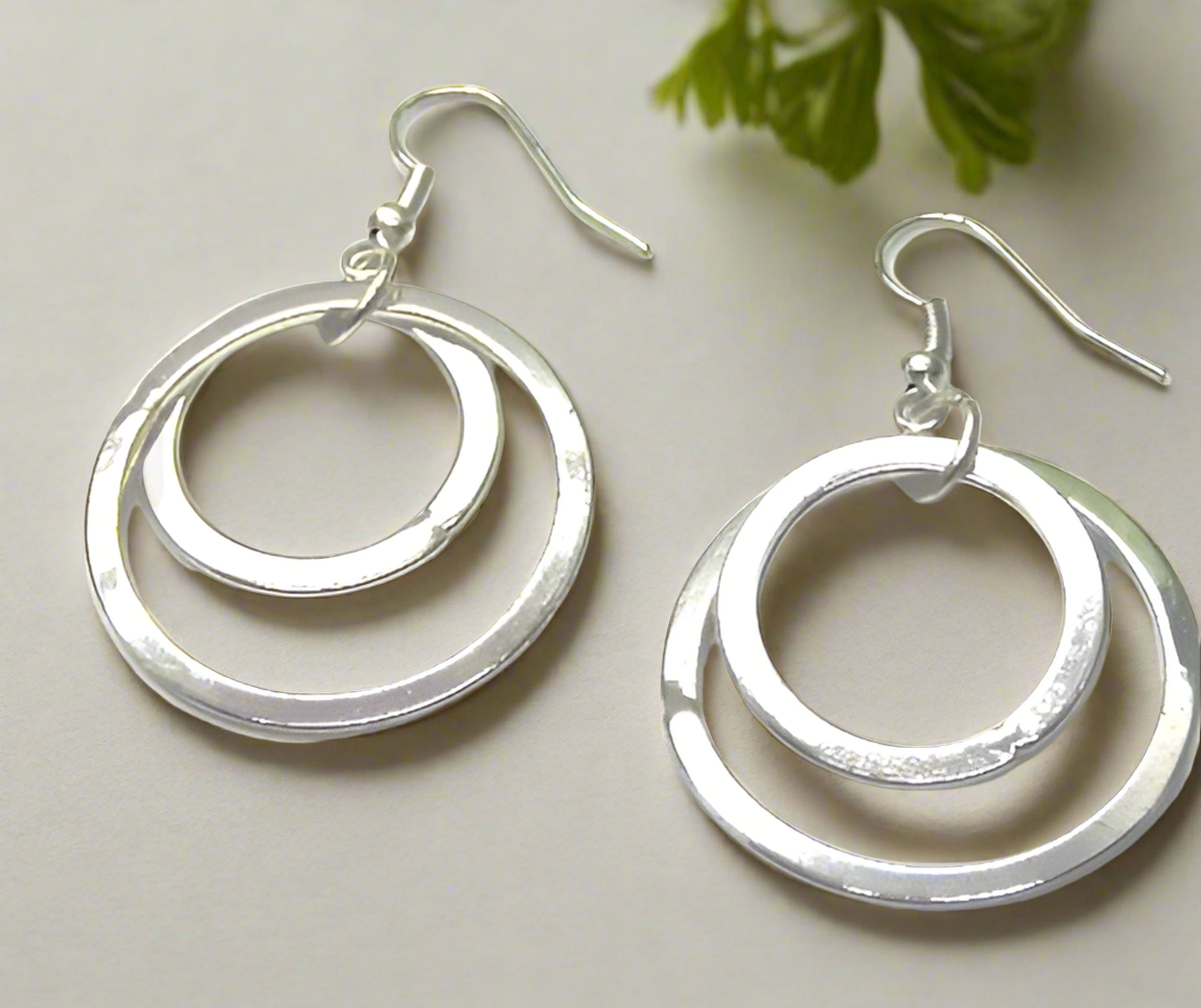https://www.artistryjewelry.net/products/fantastic-silver-circle-earrings