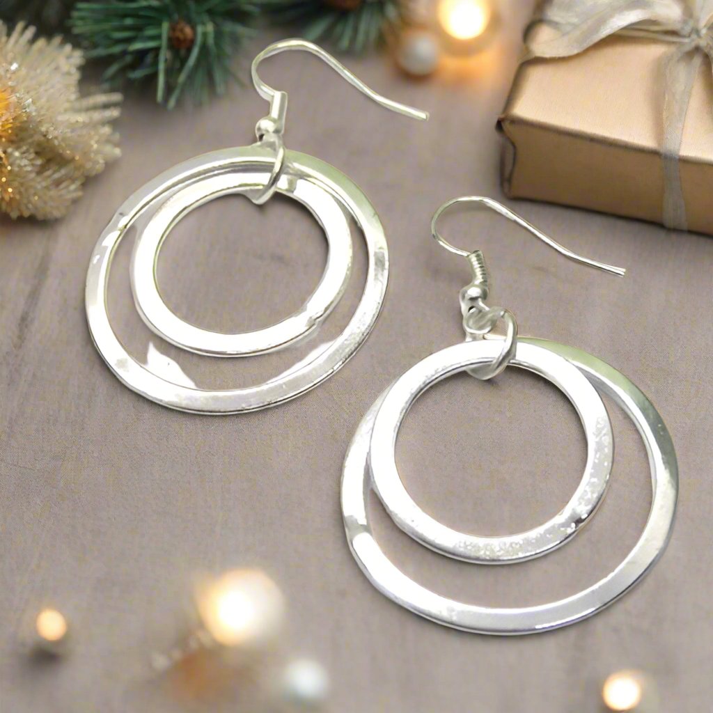 https://www.artistryjewelry.net/products/fantastic-silver-circle-earrings