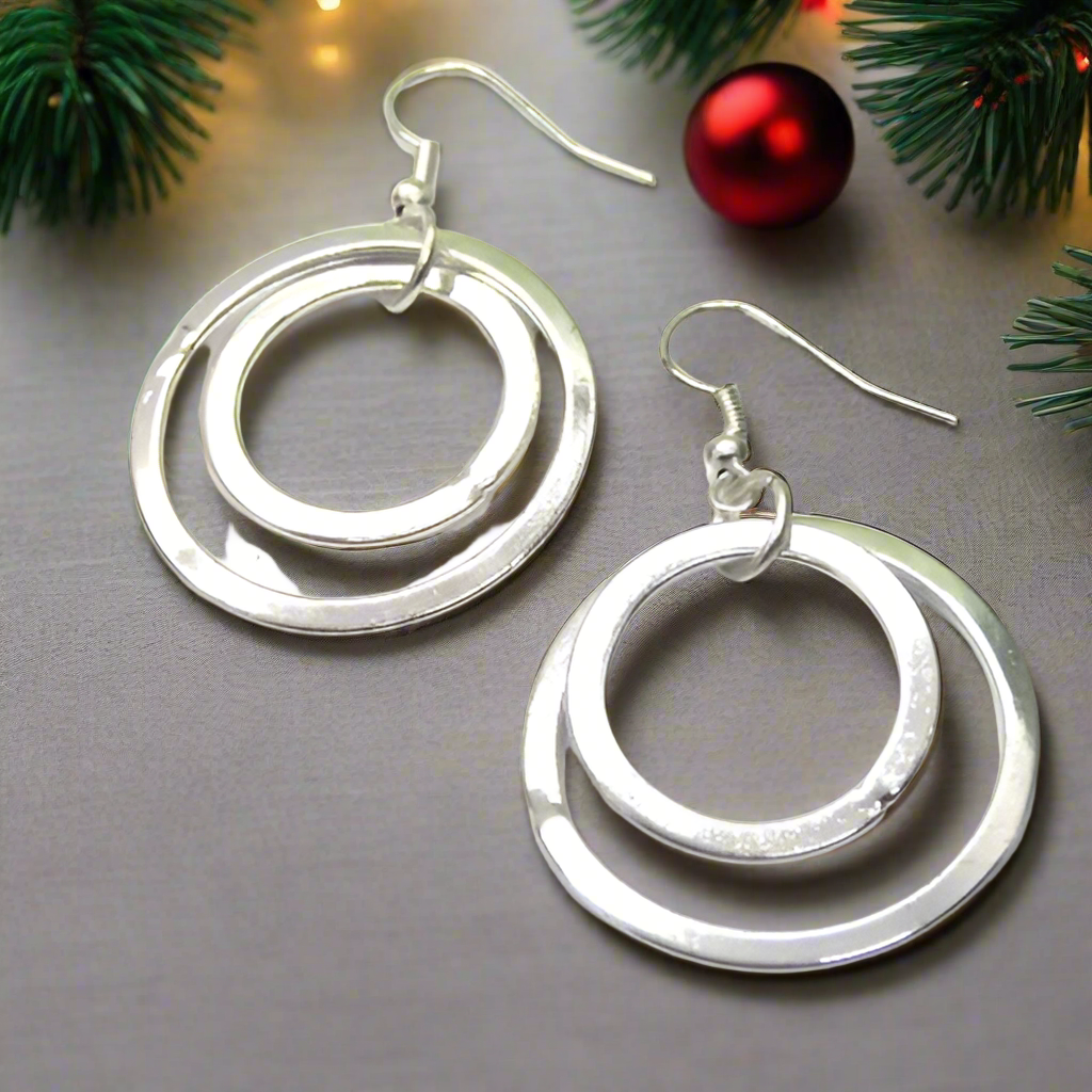 https://www.artistryjewelry.net/products/fantastic-silver-circle-earrings