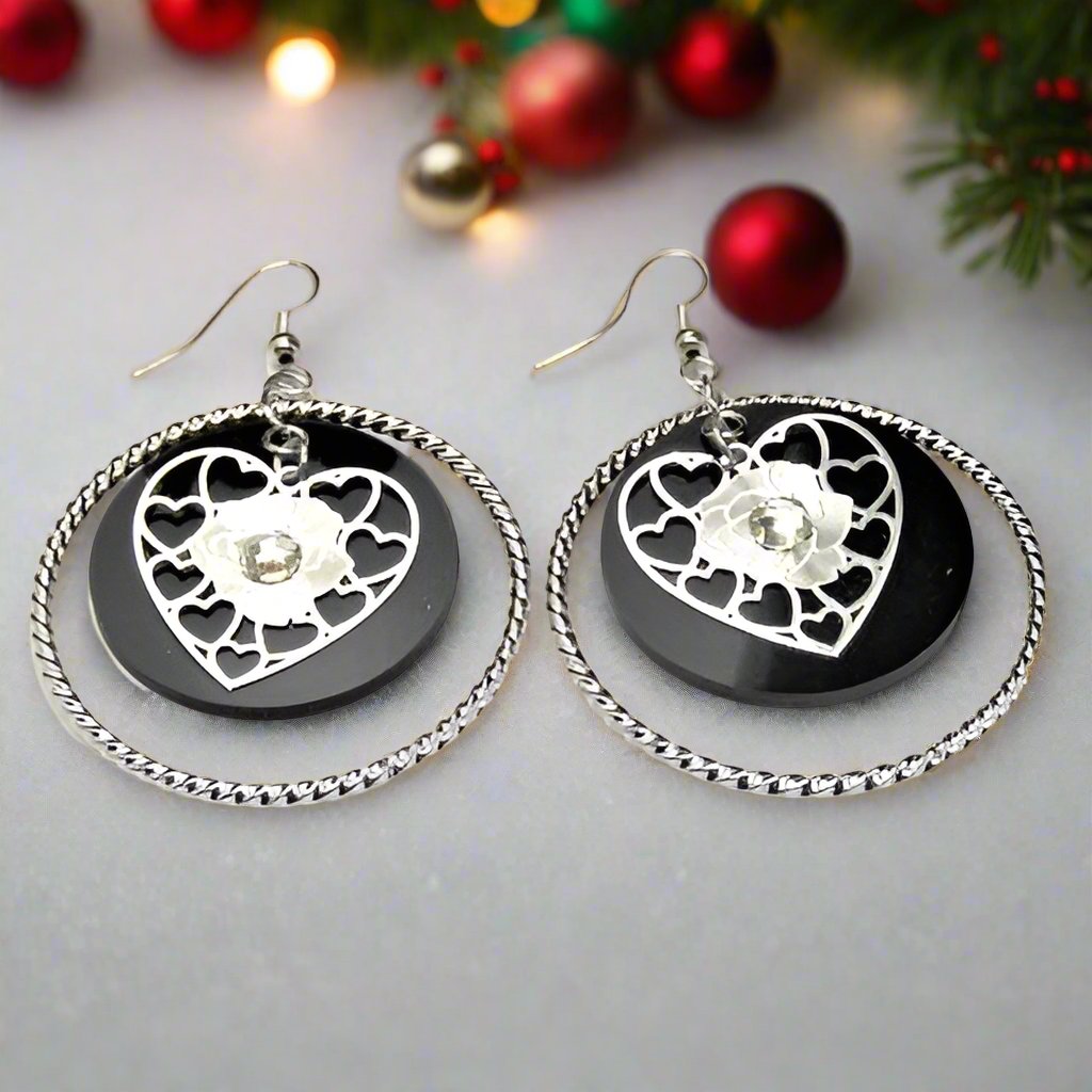 https://www.artistryjewelry.net/products/charming-heart-earrings