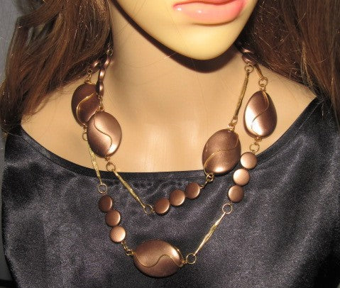 https://www.artistryjewelry.net/products/lovely-bronze-long-necklace