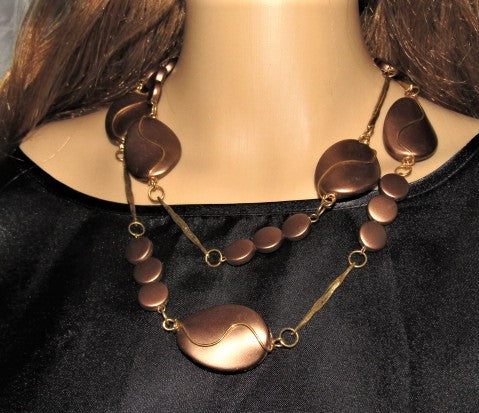 https://www.artistryjewelry.net/products/lovely-bronze-long-necklace