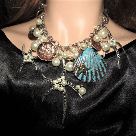 https://www.artistryjewelry.net/products/starfish-and-shell-statement-necklaces-set
