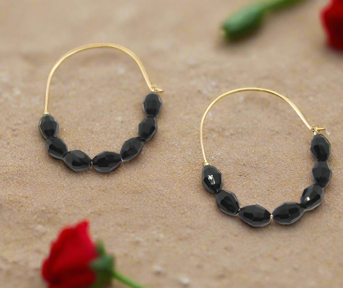 https://www.artistryjewelry.net/products/black-wire-hoop-earrings