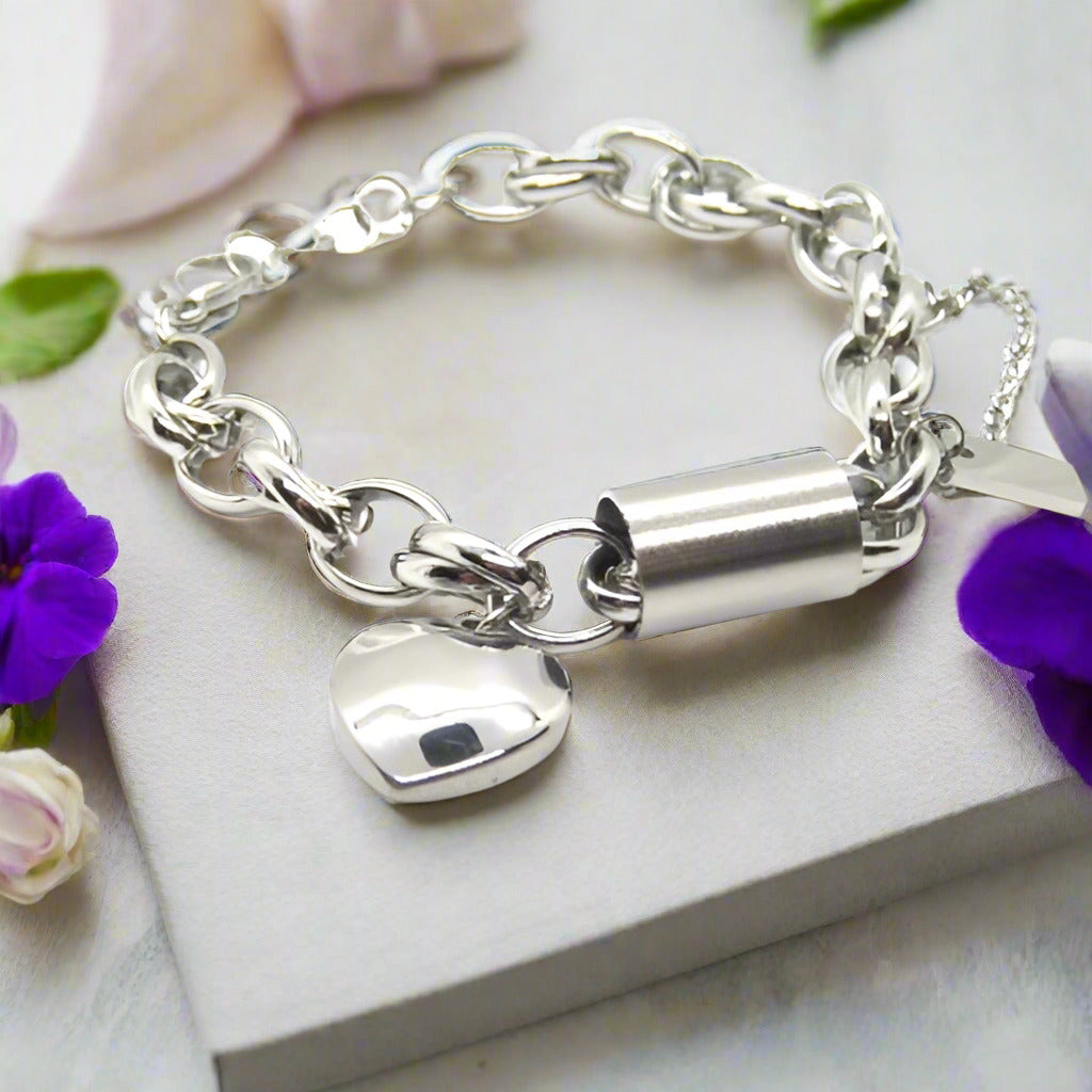 https://www.artistryjewelry.net/products/exciting-silver-heart-and-chain-bracelet