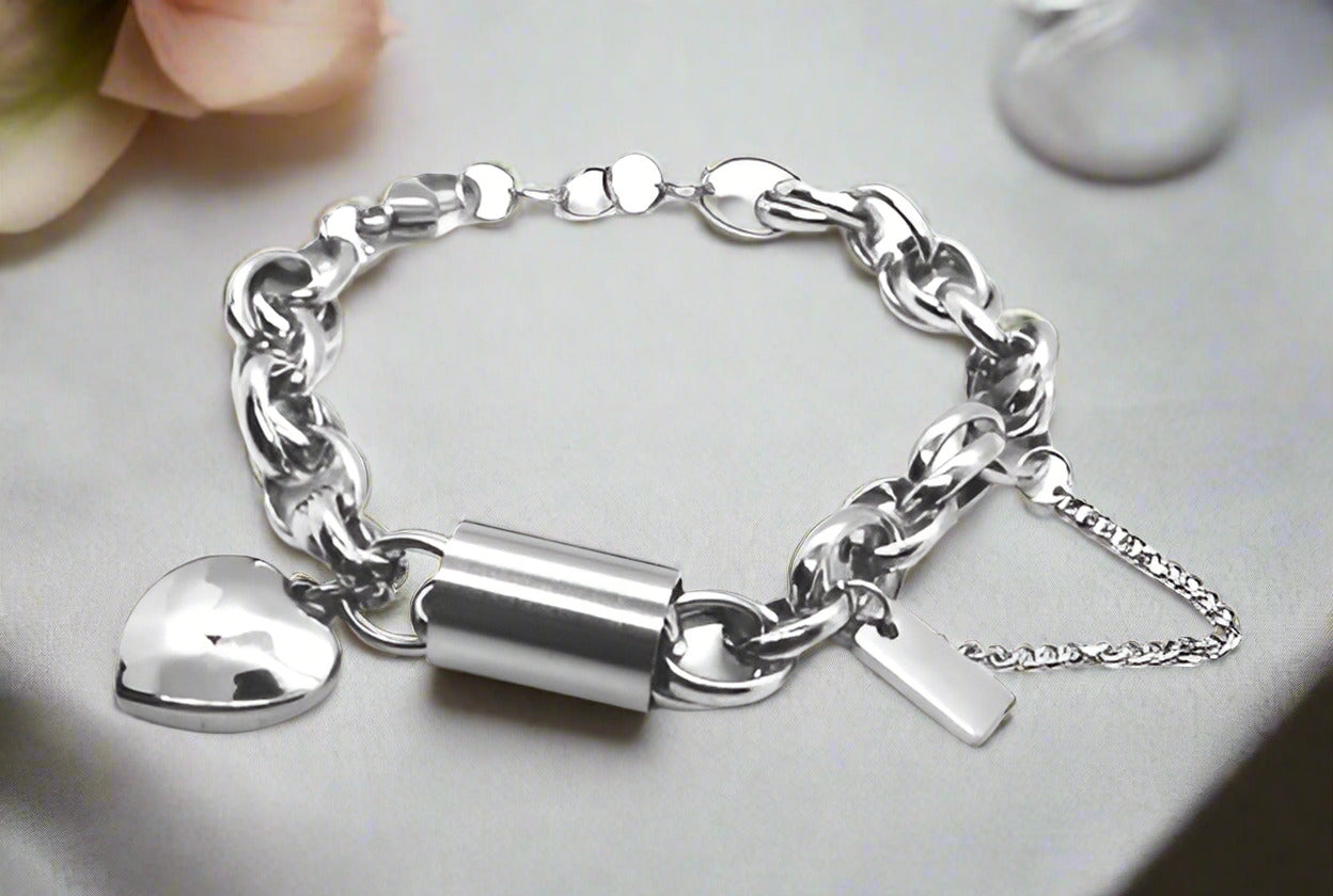https://www.artistryjewelry.net/products/exciting-silver-heart-and-chain-bracelet