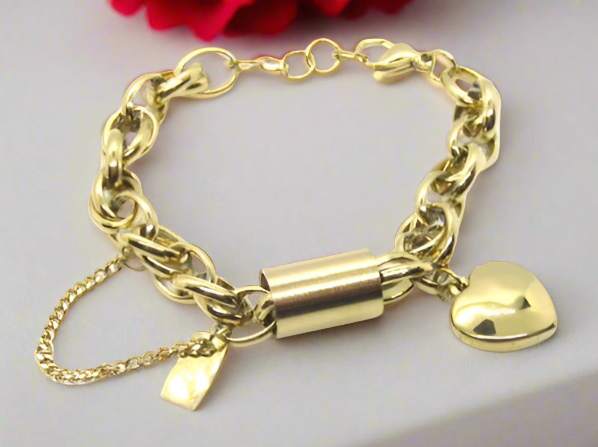 https://www.artistryjewelry.net/products/exciting-puffy-gold-heart-charm-chain-bracelet