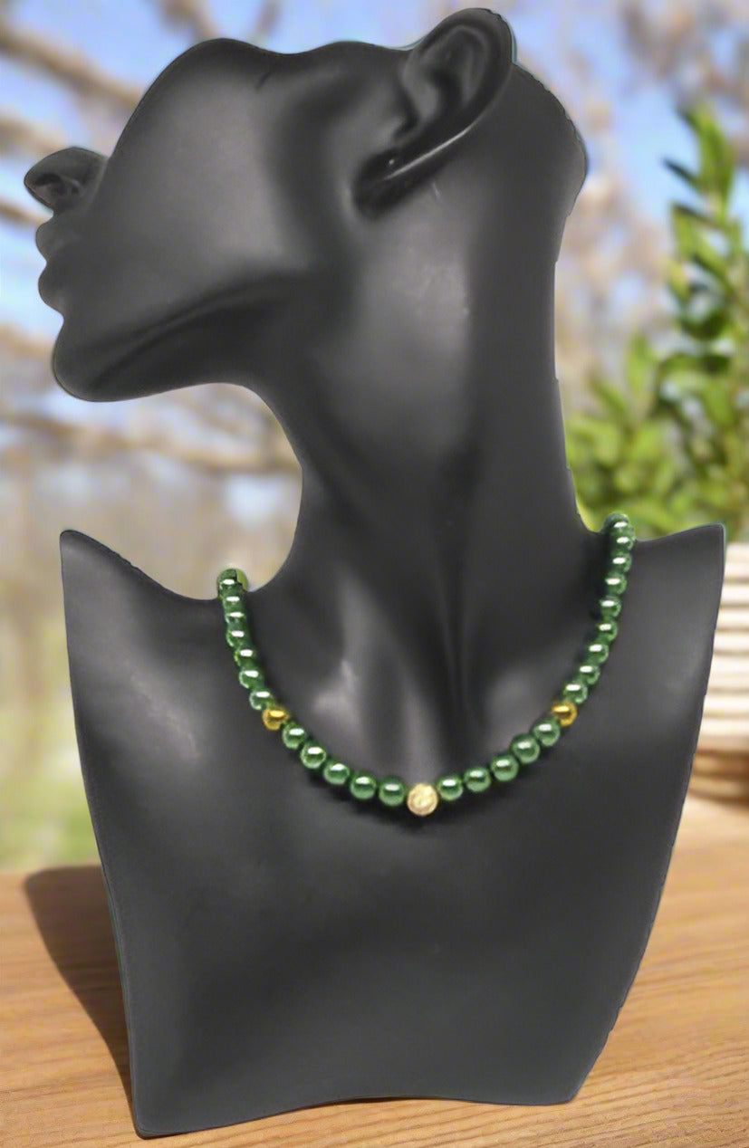 https://www.artistryjewelry.net/products/stunning-olive-green-and-hematite-necklace