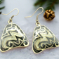 https://www.artistryjewelry.net/products/lovely-green-glitter-earrings