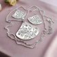 https://www.artistryjewelry.net/products/stunning-fancy-silver-necklace-set