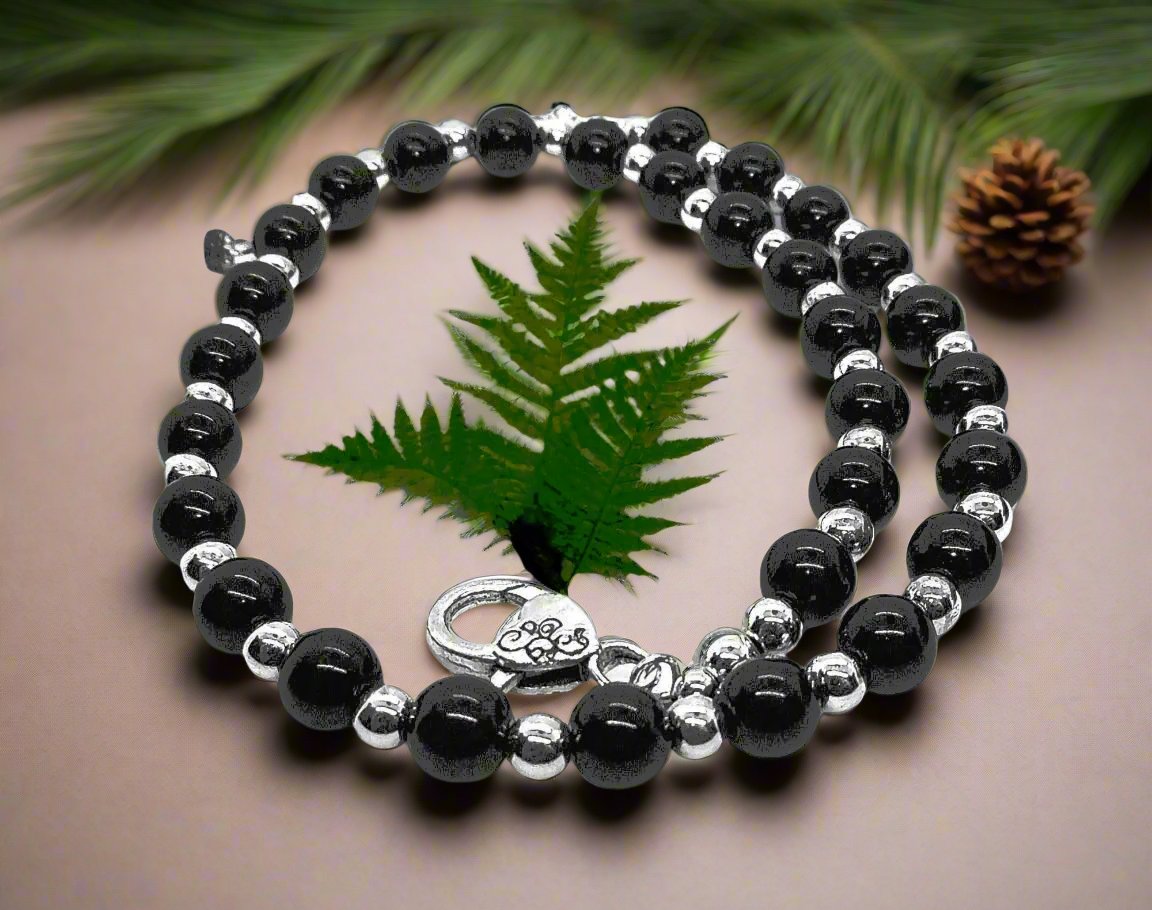 https://www.artistryjewelry.net/products/flaunting-silver-flower-necklace