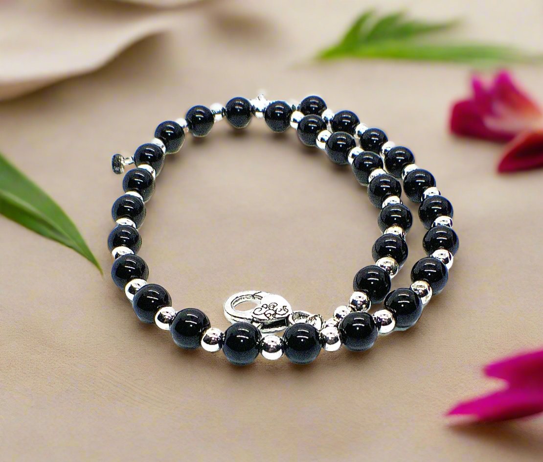 https://www.artistryjewelry.net/products/flaunting-silver-flower-necklace
