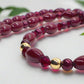 https://www.artistryjewelry.net/products/lovely-burgundy-surprise-necklace