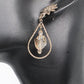 https://www.artistryjewelry.net/products/swarvorski-golden-shadow-earrings