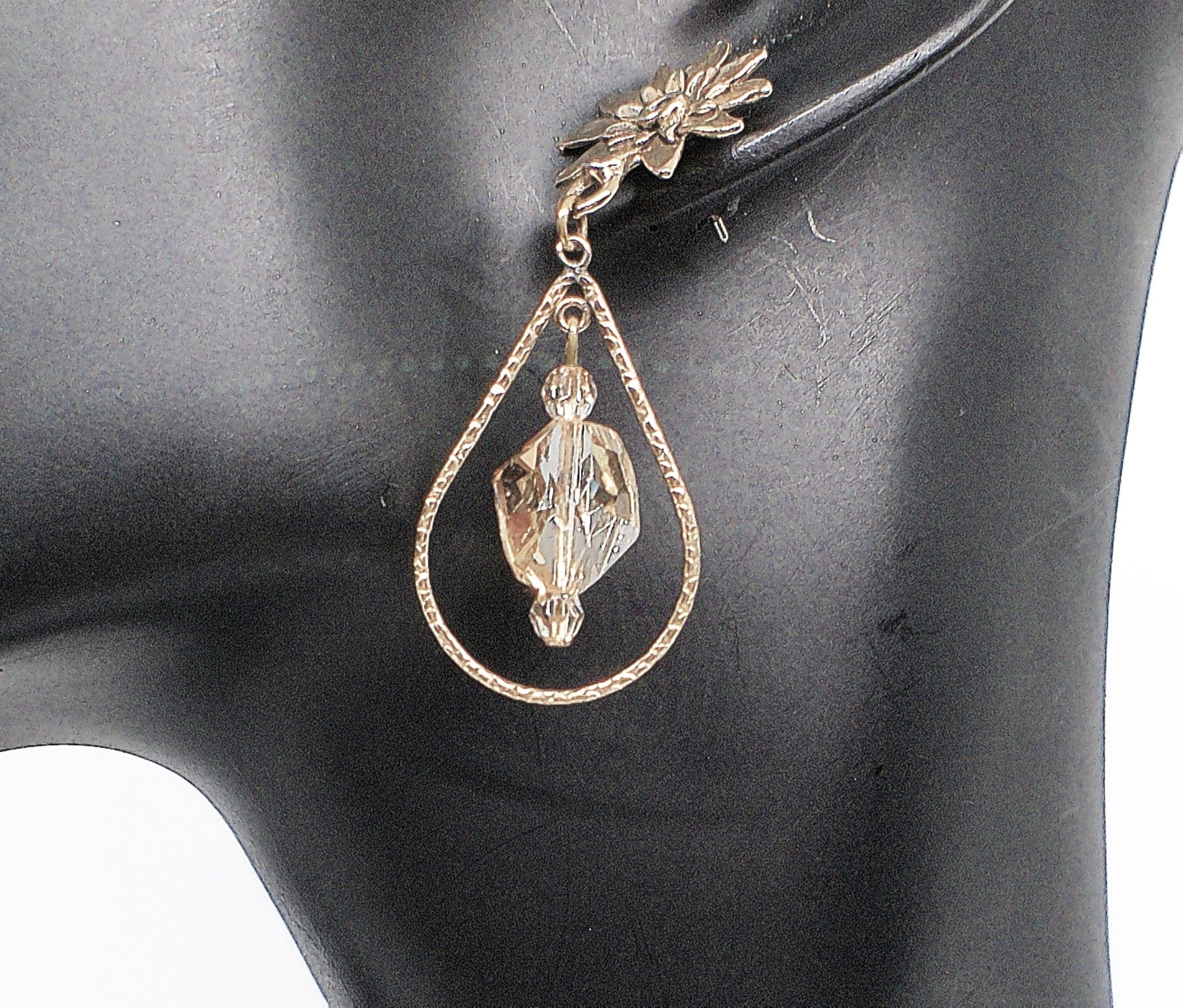 https://www.artistryjewelry.net/products/swarvorski-golden-shadow-earrings