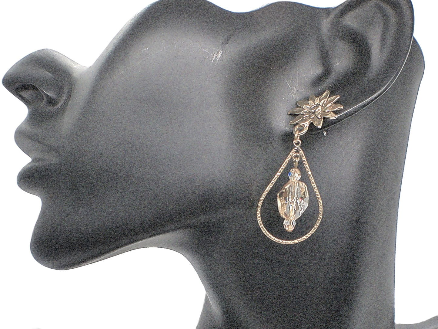https://www.artistryjewelry.net/products/swarvorski-golden-shadow-earrings