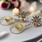 https://www.artistryjewelry.net/products/swarvorski-golden-shadow-earrings
