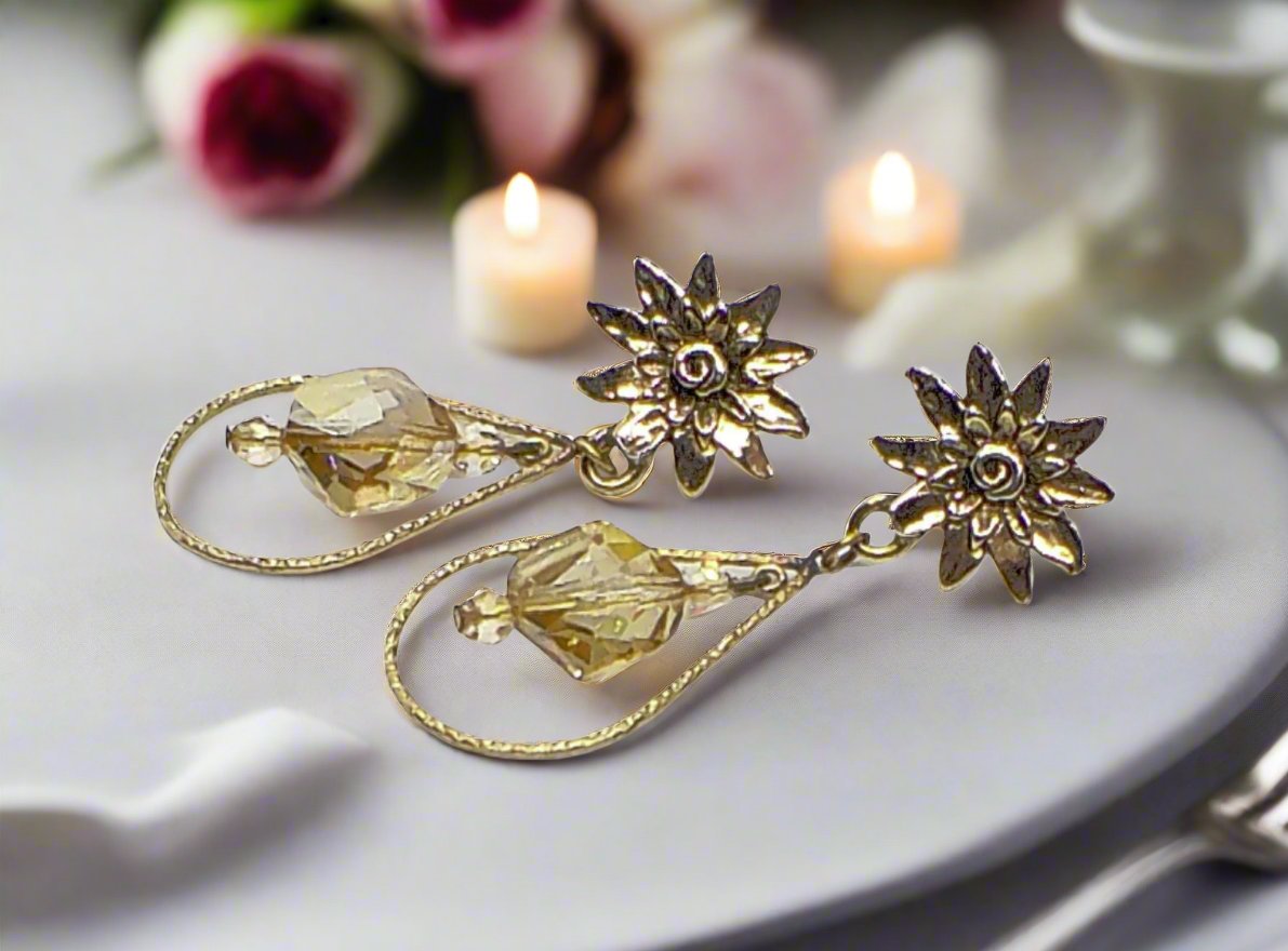 https://www.artistryjewelry.net/products/swarvorski-golden-shadow-earrings