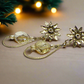 https://www.artistryjewelry.net/products/swarvorski-golden-shadow-earrings