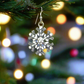 https://www.artistryjewelry.net/products/beautiful-soft-white-snowflake-earrings