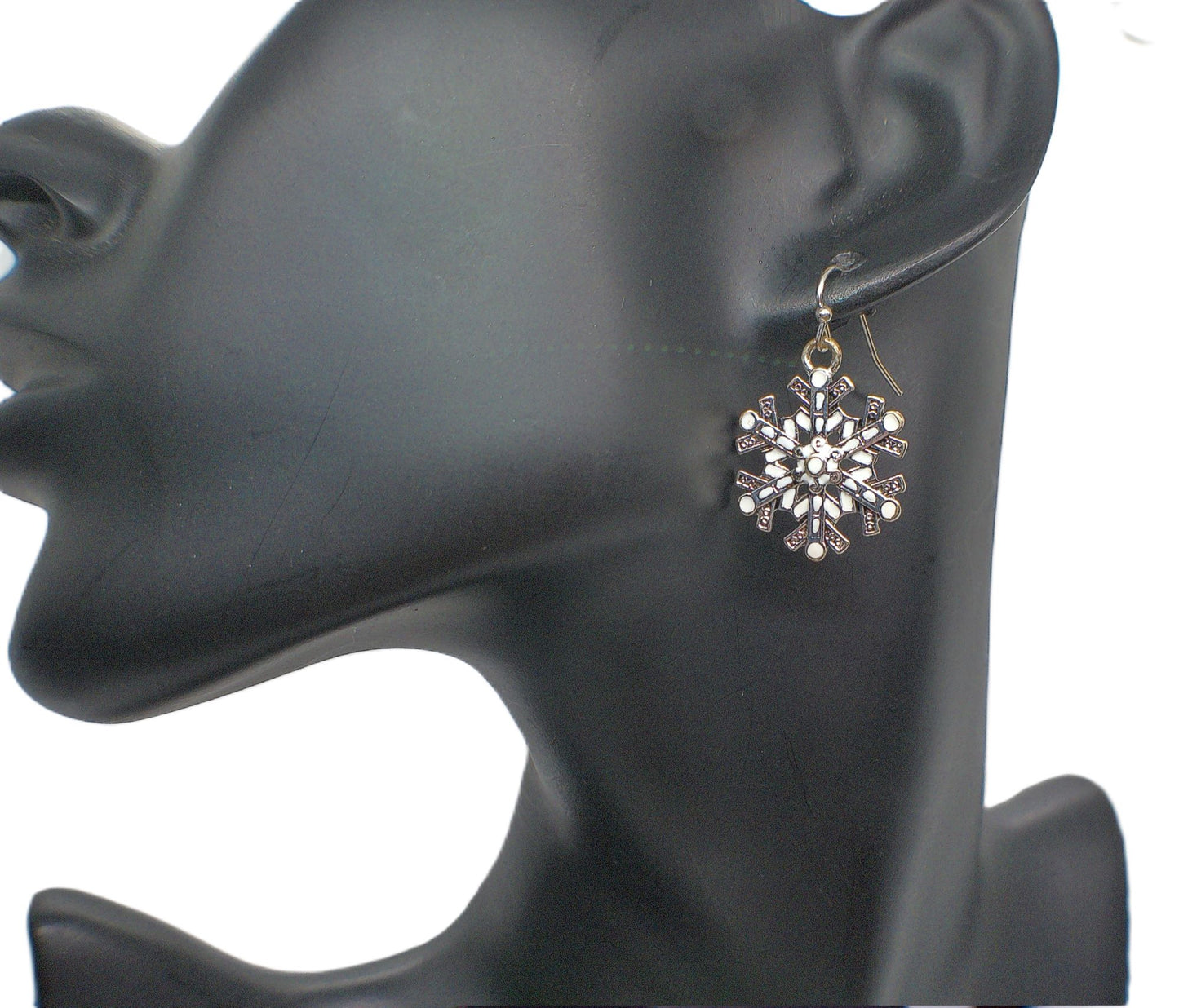https://www.artistryjewelry.net/products/beautiful-soft-white-snowflake-earrings