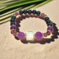 Go To: https://www.artistryjewelry.net/products/amethyst-and-black-garnet-yoga-bracelet