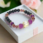 Go To: https://www.artistryjewelry.net/products/amethyst-and-black-garnet-yoga-bracelet