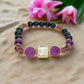 Go To: https://www.artistryjewelry.net/products/amethyst-and-black-garnet-yoga-bracelet