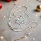https://www.artistryjewelry.net/products/stunning-crystal-snowflake-necklace