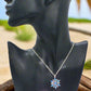 https://www.artistryjewelry.net/products/lovely-blue-winter-snowflake-necklace