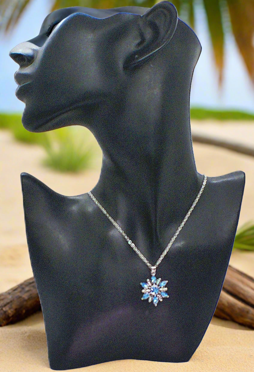 https://www.artistryjewelry.net/products/lovely-blue-winter-snowflake-necklace