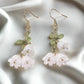 https://www.artistryjewelry.net/products/precious-white-flower-dangle-earrings